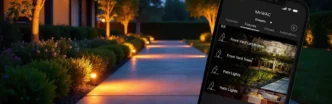 Vibrant, illuminated pathway with a phone opened on an app-controlled lighting screen at the forefront.