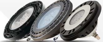 Three different par36 outdoor lighting bulbs against a neutral, monochromatic backdrop.