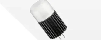 T3 wedge light bulb at a 45 degree tilted angle against a white and gray backdrop.