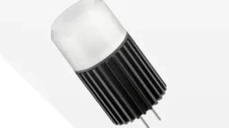 T3 wedge light bulb at a 45 degree tilted angle against a white and gray backdrop.